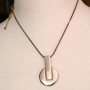 Silver chain with barred circle